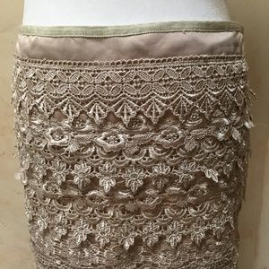 Sans Souci lace mini skirt in gold